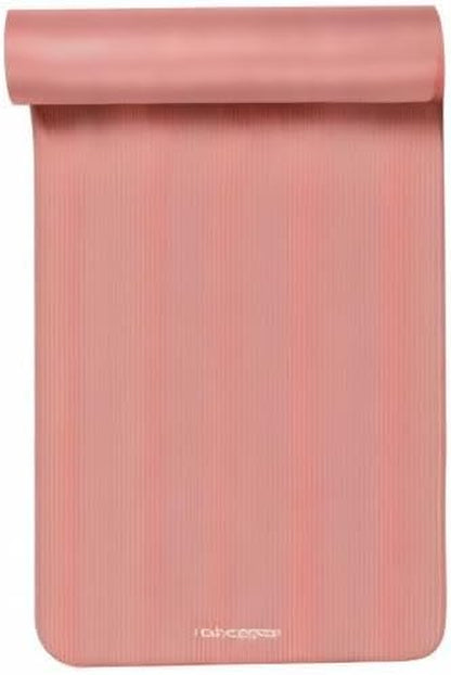 Solana extra thick non-slip yoga mat with a pink ribbed surface and nylon strap for comfort and stability.