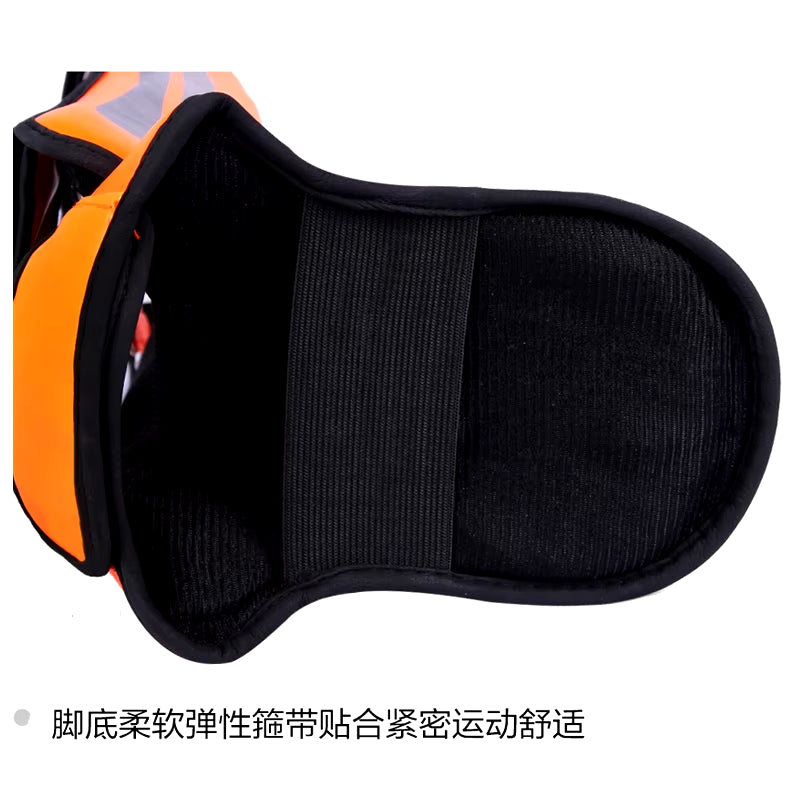 Inside view of kickboxing shin guard pads showcasing soft fabric and vibrant orange design.