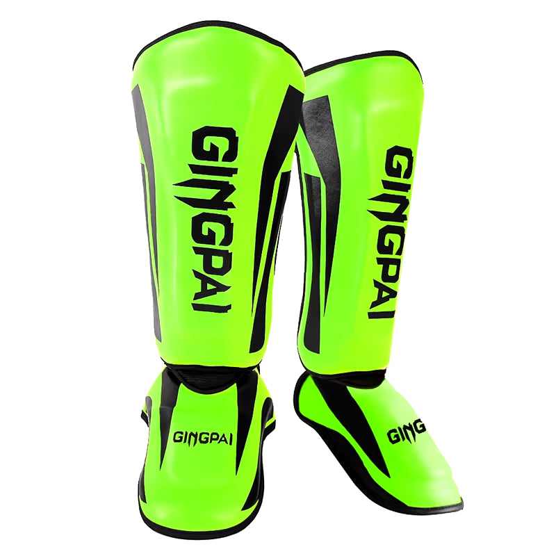 kickboxing shin guard pads in bright green color for martial arts protection.
